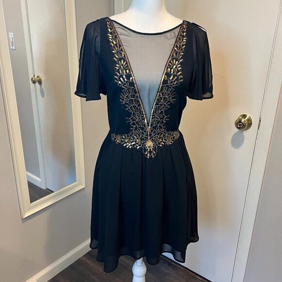 bebe Dresses & Skirts - bebe Black with Gold sequins Mesh Chiffon Mini Dress, Size 2